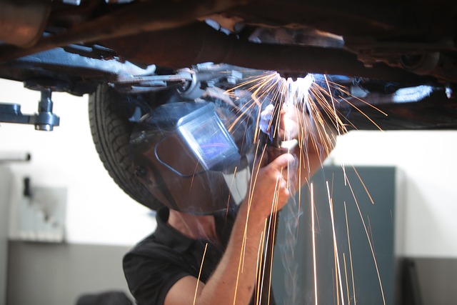 Close-view inspection of an engine's timing belt.
