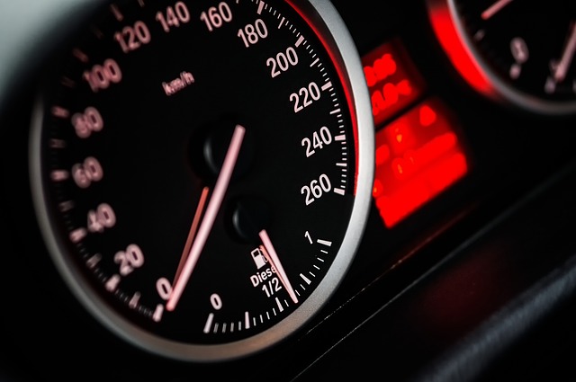 Close-view inspection of an engine's timing belt.